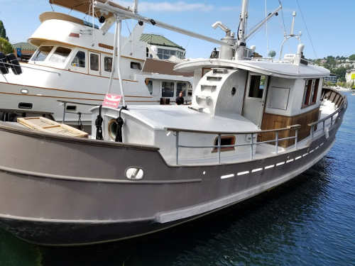 Pisces Tugboat side